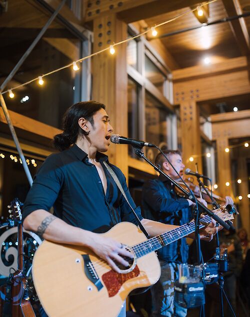 two singers performing